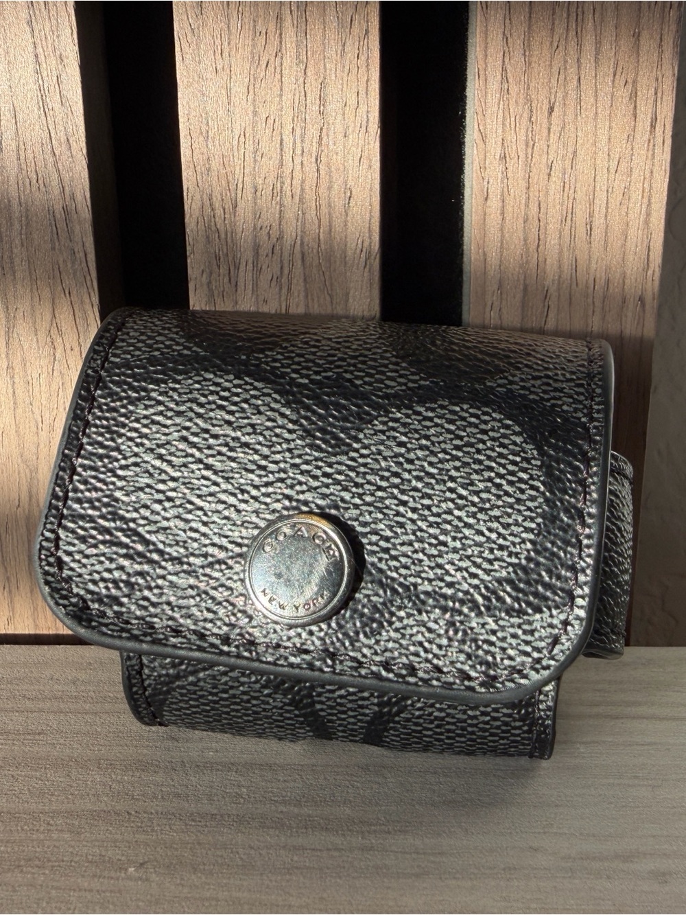 Coach Black Signature Pebbled Leather Snap AirPods Pro Case